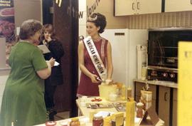 American Honey Queen serving ice creams at the 1972 Little International Agricultural Exposition at South Dakota State University.