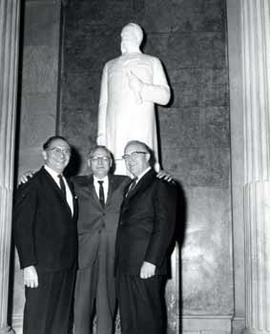 Representatives Ben Reifel and E.Y. Berry with another man