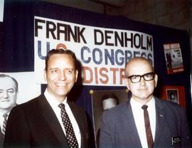 Frank Denholm at a South Dakota Democratic Party campaign rally standing next to a man.