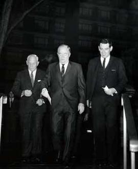 Vice President Hubert Humphrey walks with other men
