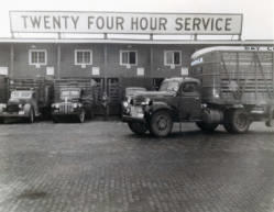 Denholm trucking business offered twenty four hour service and was owned by Frank Denholm