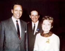 Frank Denholm and Millie Denholm with a man
