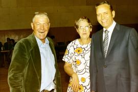 Frank Denholm with two constituents at a campaign event.