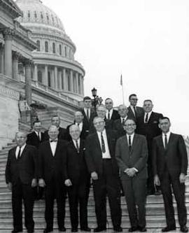 Representative Ben Reifel and Representative E.Y. Berry are with other legislators on the US Capitol steps in 1967