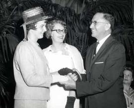 Representative Ben Reifel and Senator Karl Mundt at a reception for South Dakota's best Homemaker of Tomorrow in 1963