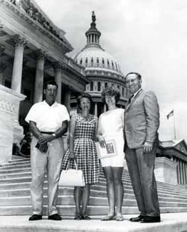 Representative Ben Reifel with Mr. and Mrs. E.C. Leonard and daughter on the steps of the US Capitol in 1965