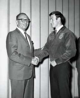Representative Ben Reifel shaking hands with Paul Bixler in 1969