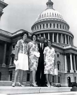 Representative Ben Reifel, Alice Reifel, Nancy Hanly, and Patricia Donahue on the US Capitol steps in 1964