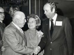 Orran Hofstetter (left) of Basic Incorporated in Orrville, Ohio greets Congressman Frank Denholm and his wife Millie Denholm at the National Limestone Institute Convention in Washington, D.C.