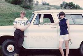 Warren Keammerer and Janet Johnson standing next to the field vehicle used for Missouri River research in 1969-70.
