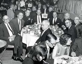 Representative Ben Reifel, Senator Karl Mundt, and Representative E.Y. Berry at a luncheon