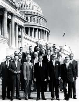 Representative Ben Reifel with a group of men on the steps of the US Capitol