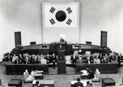 Members of a Congressional delegation sitting in on a session of the South Korean parliament.