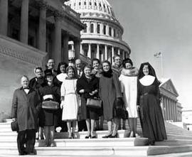 Representative Ben Reifel and Alice Reifel with constituents on the steps of the US Capitol in 1964