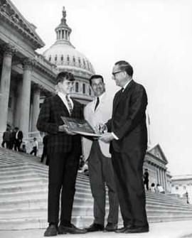 Representative Ben Reifel with Marvin and Gary Widmann on the steps of the US Capitol