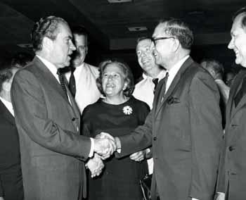 Representative Ben Reifel shakes hands with Richard Nixon