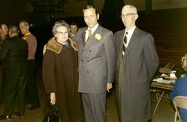 Frank Denholm with two constituents at an event.
