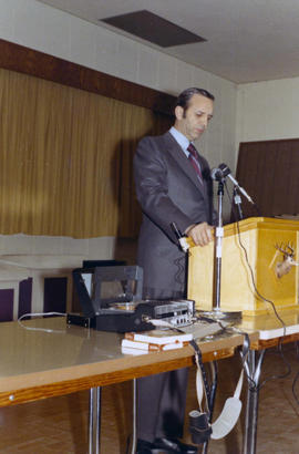 Frank Denholm speaking at an event