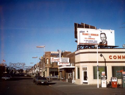 Elect Frank E. Denholm for U.S. Congress 'A New Strong Voice for South Dakota - Farmer - Businessman - Former FBI Agent - Educator - Lawyer (Democratic Candidate for all the people!)' campaign billboard in Brookings, South Dakota
