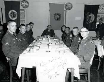 Representative Ben Reifel sharing a meal with cadets in 1964