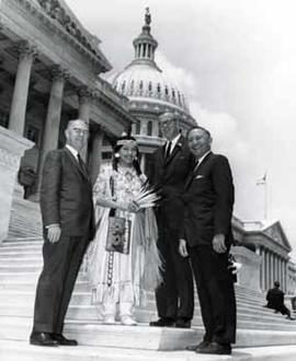 Representative Ben Reifel with Miss Indian American and others on the steps of the US Capitol in 1964