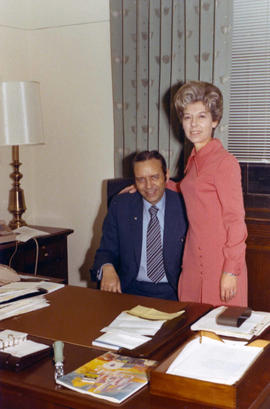 Frank Denholm and a woman in his Washington, D.C. office.