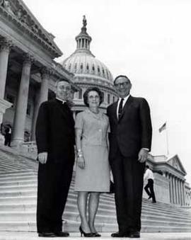 Representative Ben Reifel and Alice Reifel with Father John F. Bryde on the steps of the US Capitol