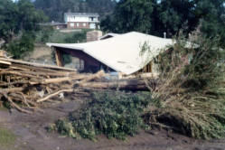 Flood damage in Rapid City, South Dakota following 15 inches of rain over a small area in the Black Hills caused Rapid Creek and other waterways to overflow on June 9, 1972.