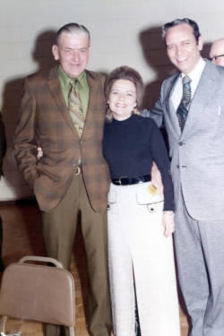 Frank and Millie Denholm with a man at a campaign event.