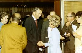 Frank Denholm greeting people at a campaign event.