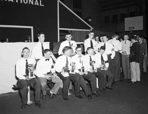 Winners holding their trophies at the 1953 Little International Exposition at South Dakota State College.