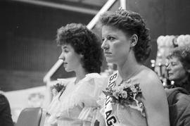 SDSU Ag Queen and another woman watch judging at the 1986 Little International Agricultural Exposition at South Dakota State University.
