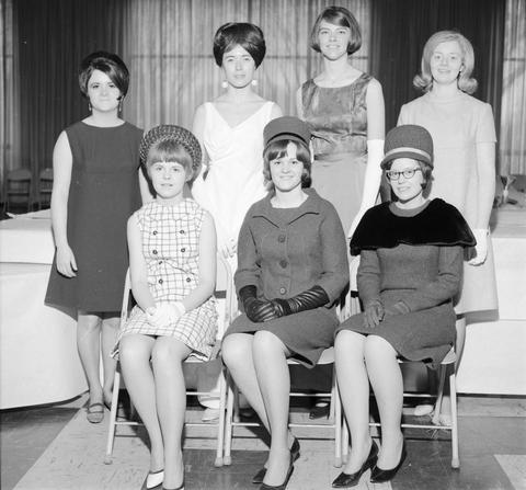 Seven women wear their clothing entries for the home economics style show during the 1967 Little International exposition at South Dakota State University.