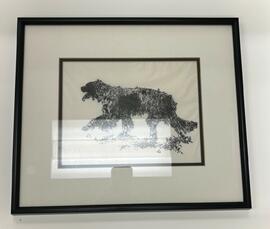 Artwork that appeared in the SD Digest depicting a shaggy dog walking towards the left. The dog is black and white. Framed size is 18" x 15.5”. A note on the back says “Dog Last Hunt #3”.