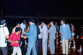 South Dakota basketball delegation exchanging flags with Cuban national team