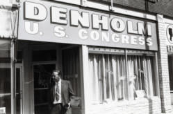 Frank Denholm standing in front of his campaign headquarters