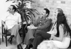 James Abourezk and George McGovern speaking with Raul Castro and unidentifed woman in Cuba