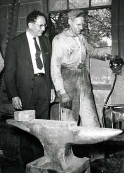 Ben Reifel in a blacksmith shop in 1960