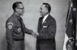 Representative Ben Reifel with a Boys Scouts leader in Aberdeen, South Dakota in 1964