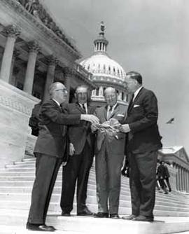 Representative Ben Reifel, Representative E.Y. Berry, John Foster, and William Morrison on the US Capitol steps in 1964