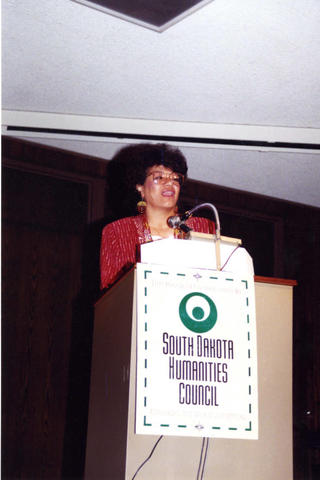 Roberta Hill speaking at poetry reading at a South Dakota Humanities Council event.