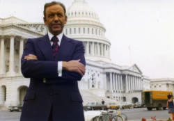 Congressman Frank Denholm stands on the steps of the U.S. Capitol building