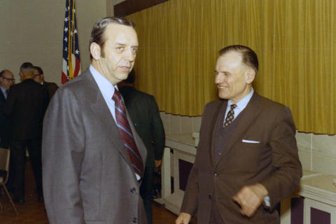 South Dakota State University president Hilton Briggs and Frank Denholm at an event.