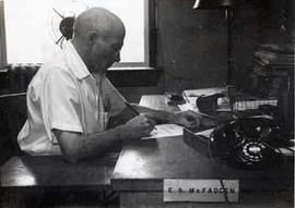 Edgar S. McFadden at work in his office at Texas A & M University
