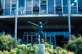 Statue of nude woman in a garden outside of a building in Cuba