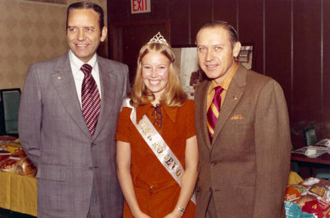 Frank Denholm and another man are with the South Dakota Honey Queen.