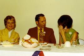 Frank and Millie Denholm at a luncheon during the 1970 campaign. Frank is talking to a woman to his left.
